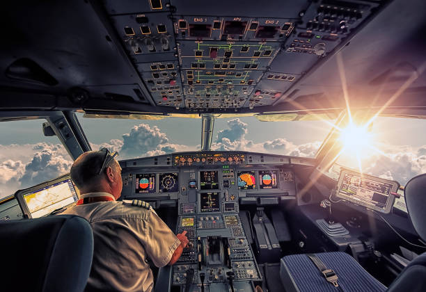 Inside an aircraft September 2016 - In The Air, French airspace - The cockpit of an Airbus A320 in flight autopilot stock pictures, royalty-free photos & images