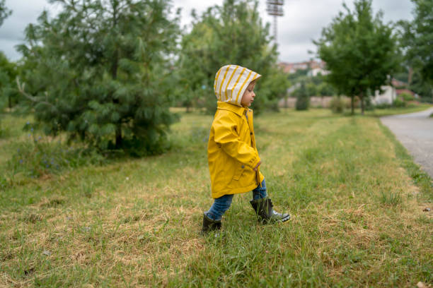 istock Little boy walking outdoors 1265056472