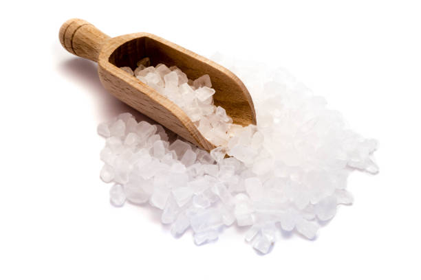 istock Sea salt isolated on white background 1265056746