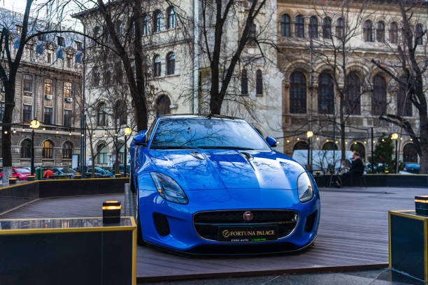 close up of a modern luxury blue jaguar f-type car, prize for gamblers. bucharest, romania, 2020 - gamblers imagens e fotografias de stock