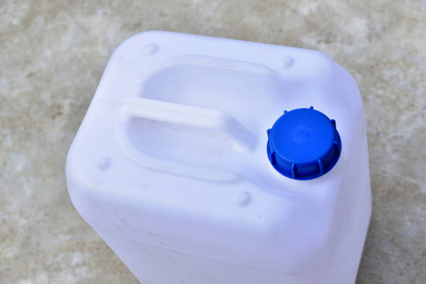 istock White plastic canister with blue lid in different positions 1265061878