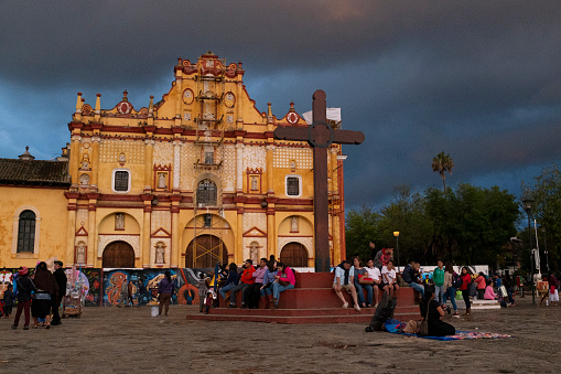 San Cristóbal de Las Casas, Mexico - June 11, 2018: View of the main square and Cathedral in the city of San Cristóbal de Las Casas in the Chiapas region, Mexico.  Vendors frequent the main square offering their wares to locals and tourists to the region.