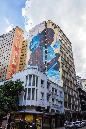 Buildings with CURA graffiti on the facades in Belo Horizonte downtown