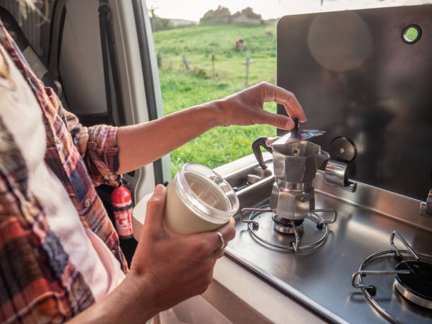 istock Woman making coffee in motorhome 1265066703