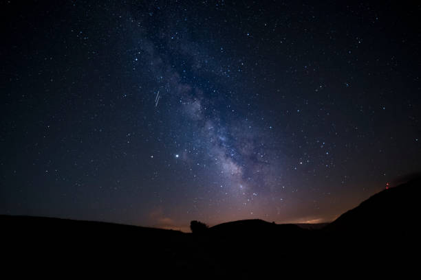 istock stary night village view milkway 1265066868