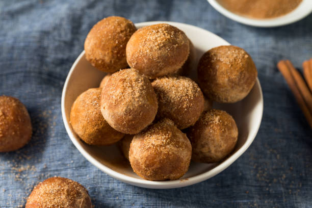 istock Homemade Fried Cinnamon Sugar Donut Holes 1265068737