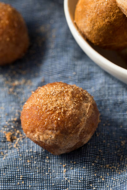 istock Homemade Fried Cinnamon Sugar Donut Holes 1265068795