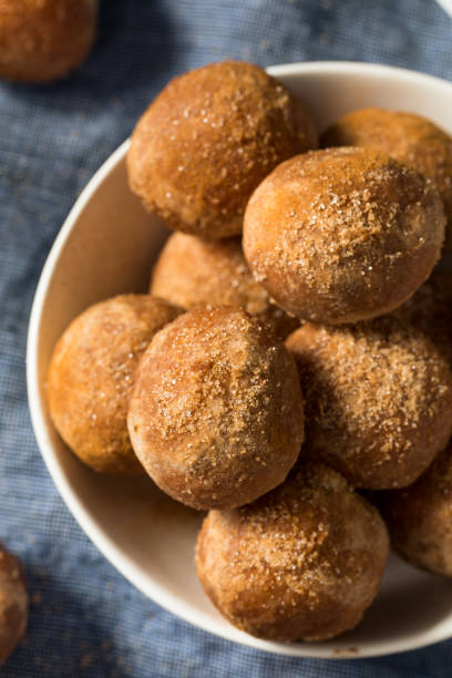 istock Homemade Fried Cinnamon Sugar Donut Holes 1265069048