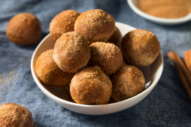 istock Homemade Fried Cinnamon Sugar Donut Holes 1265071690