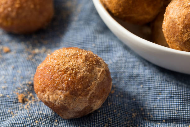 istock Homemade Fried Cinnamon Sugar Donut Holes 1265071828