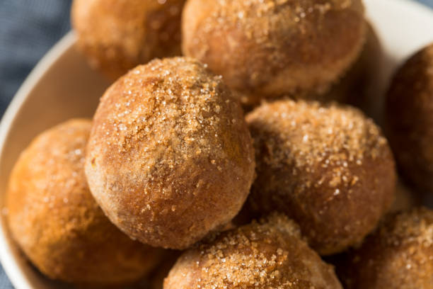 istock Homemade Fried Cinnamon Sugar Donut Holes 1265072047