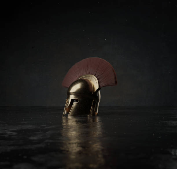 istock 3d rendering of ancient greek Sparta type helmet layed on reflection surface 1265074473