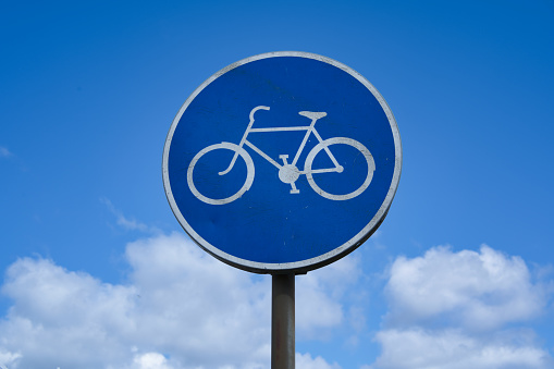 Bicycle sign and blue sky