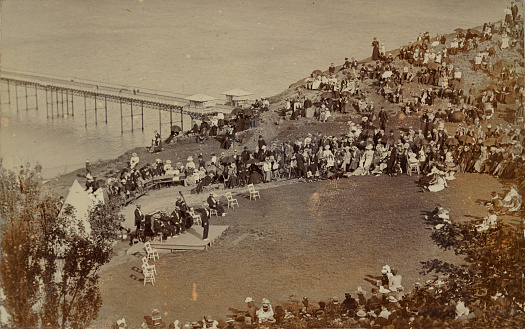 Antique photograph Llandudno, Concert in Park with the pier in the background, late 19th Century