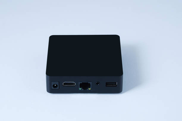 istock TV box black box. Side view of the connector panel. White background. 1265080699