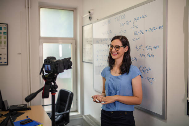 istock Young female teacher teaching video conference e-learning 1265084415