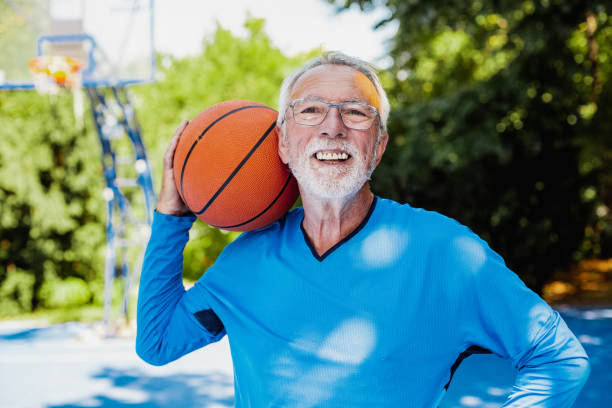 istock Active senior man ready to play basketball 1265087068