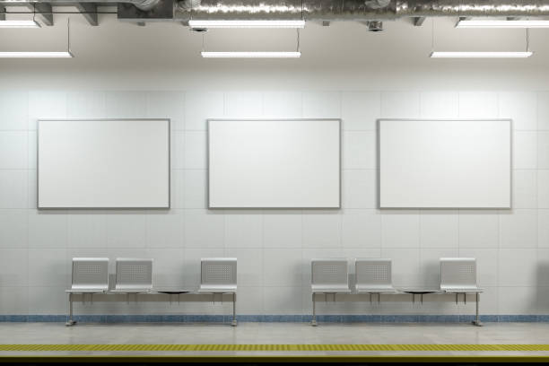 istock Three blank horizontal posters mock up on the wall of underground subway station. 1265088943