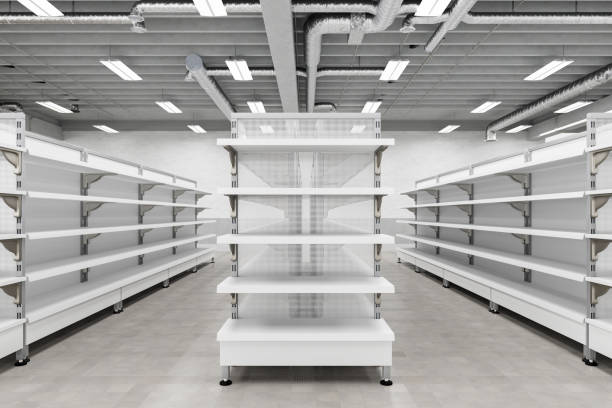 istock Supermarket interior with empty store shelves mock up. 1265089025