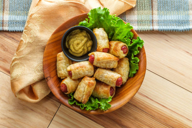 pigs in a blanket - hors imagens e fotografias de stock