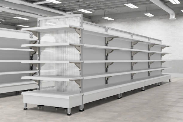 istock Supermarket interior with empty store shelves mock up. 1265089054