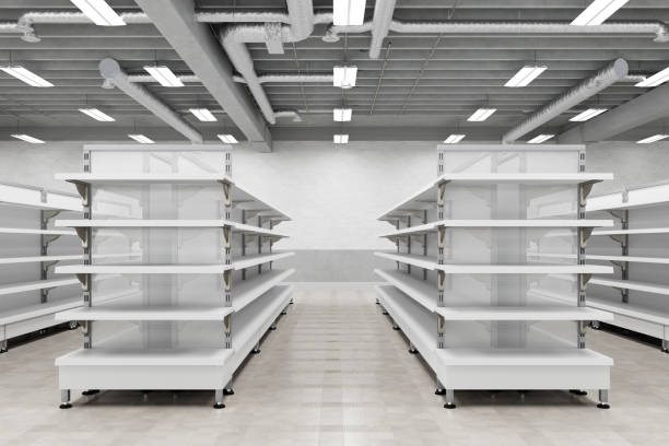 istock Supermarket interior with empty store shelves mock up. 1265089067