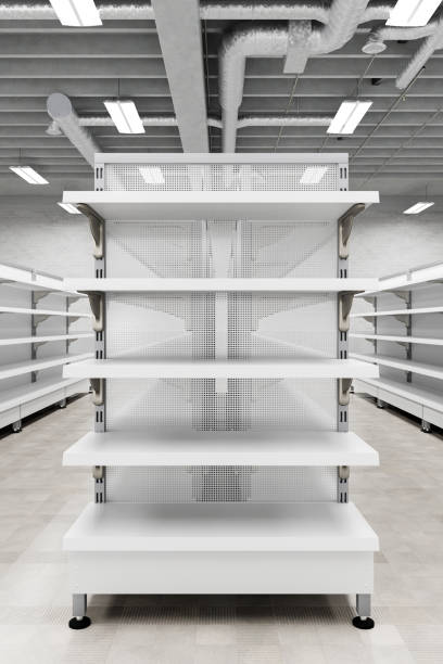 istock Supermarket interior with empty store shelves mock up. 1265089101