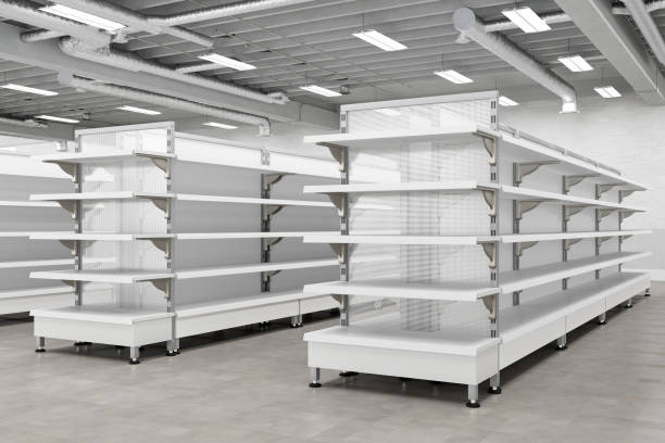 istock Supermarket interior with empty store shelves mock up. 1265089147