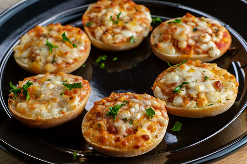 American finger food Hors d'oeuvre mini three-cheese pizza bagels