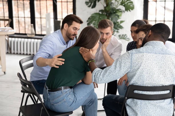 istock Rear view frustrated woman getting psychological help during counselling session 1265092992