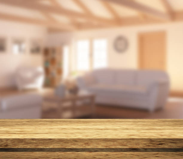 istock 3D wooden tale looking out to a defocussed lounge interior 1265095985