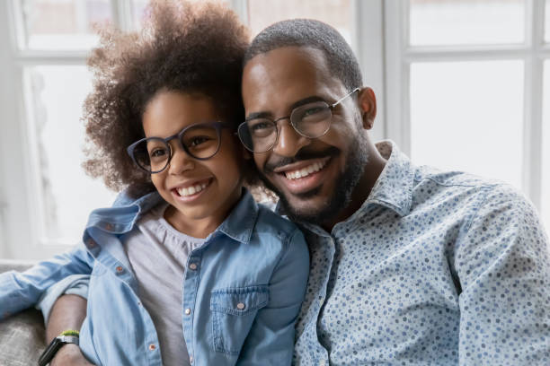 istock Happy biracial father and little daughter hugging 1265096878