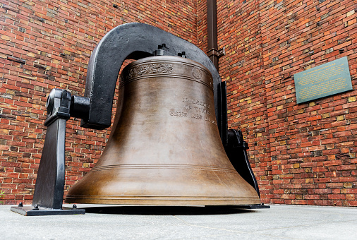Cambridge, Massachusetts, USA - August 6, 2020: The Memorial Church bronze bell was cast in 1926. Former Harvard President A. Lawrence Lowell donated the bell to the University to honor the Harvard students who died in World War I. The inscription on the casting reads \