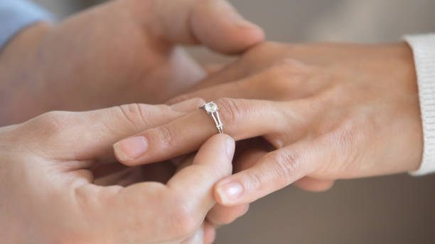 istock Affectionate millennial couple in love decided getting married. 1265099398
