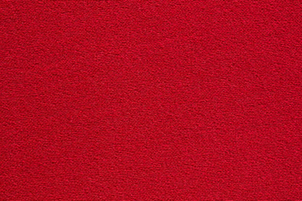 istock Red fabric cloth texture background close up 1265104951