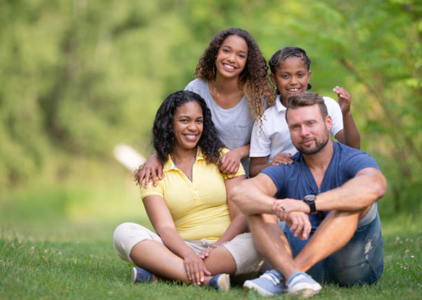 istock Family portrait sitting outside 1265106521