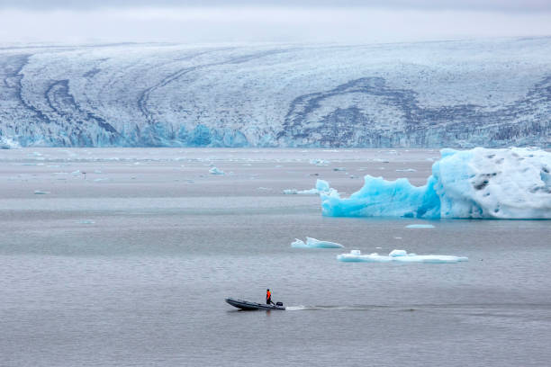 istock man on a fast motor boat sailing on a glacier lagoon in Iceland 1265106747