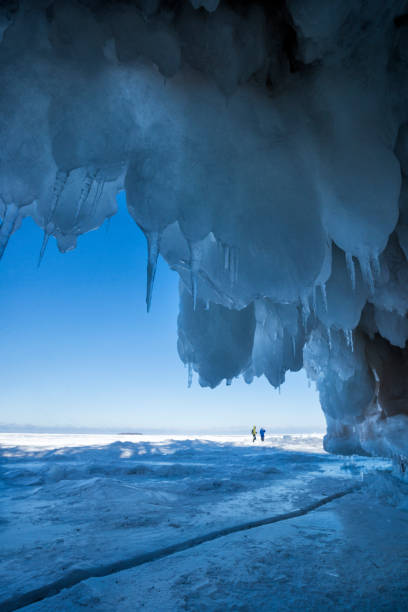 Icy blue formations framing the entrance to an ice cave at Apostle Island National Lakeshore, Cornucopia, Bayfield County, Wisconsin, USA