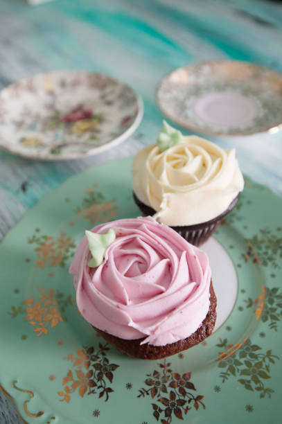 istock Pink and White Cupcakes, Flower-shaped icing 1265117884