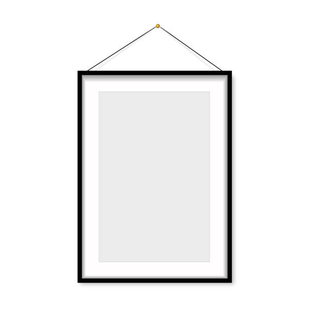 Realistic black photo frame hanging on the wall. Vector Realistic black photo frame hanging on the wall. Vector . black border photos stock illustrations