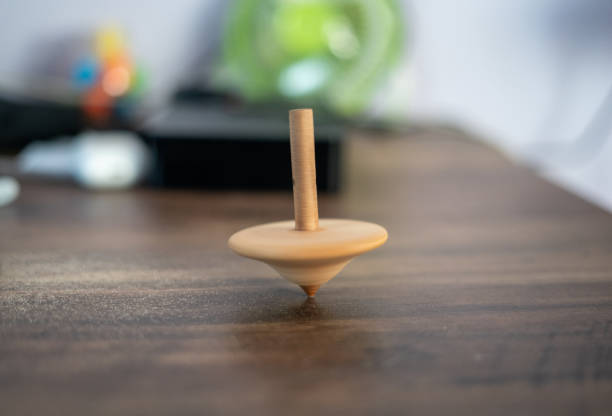 Wooden balance toy on green background, 3d rendering