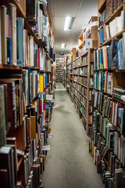 istock Stacks of old books floor to ceiling. 1265139599