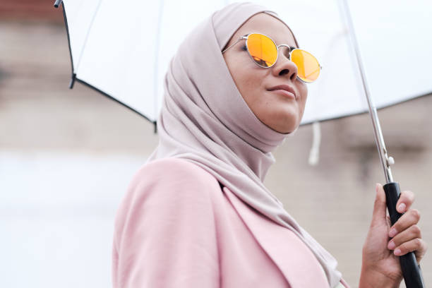 istock Muslim woman enjoying stroll 1265144133