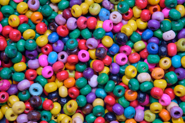 Various sewing Colorful wooden beads as background. Various sewing Colorful wooden beads as background. bead photos stock pictures, royalty-free photos & images