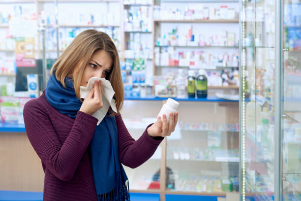 istock Ill female customes choosing medicine in apothecary. 1265151642