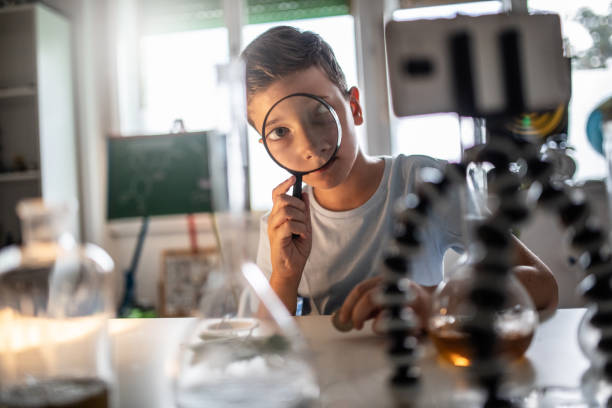 istock Boys are enjoying learning in the home laboratory. 1265152922