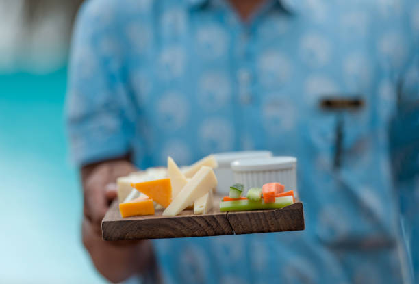 istock Serving food on wooden tray 1265157526