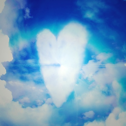 Heart-shaped clouds floating in the sky