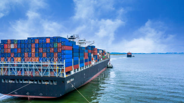 istock Container ship freight shipping maritime vessel, Global business import export commercial trade logistic and transportation cargo oversea worldwide by container ship boat, Aerial view. 1265160140