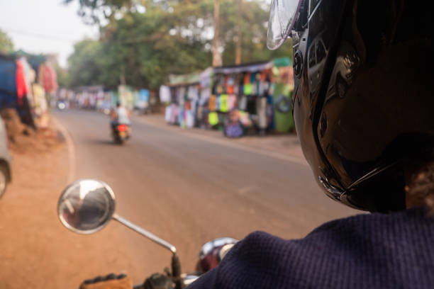 istock Driving a motorcycle in India 1265161574